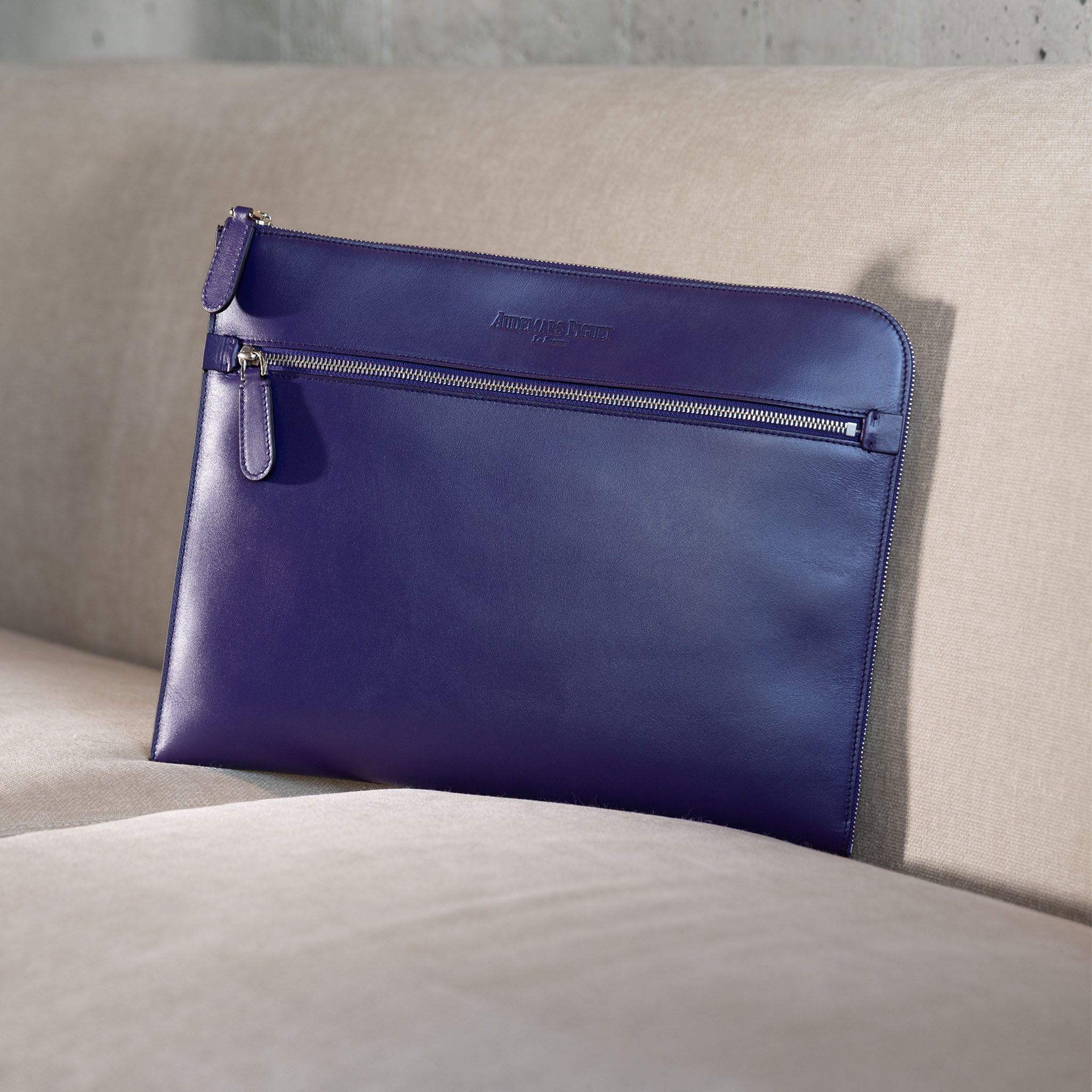 Audemars Piguet purple leather clutch