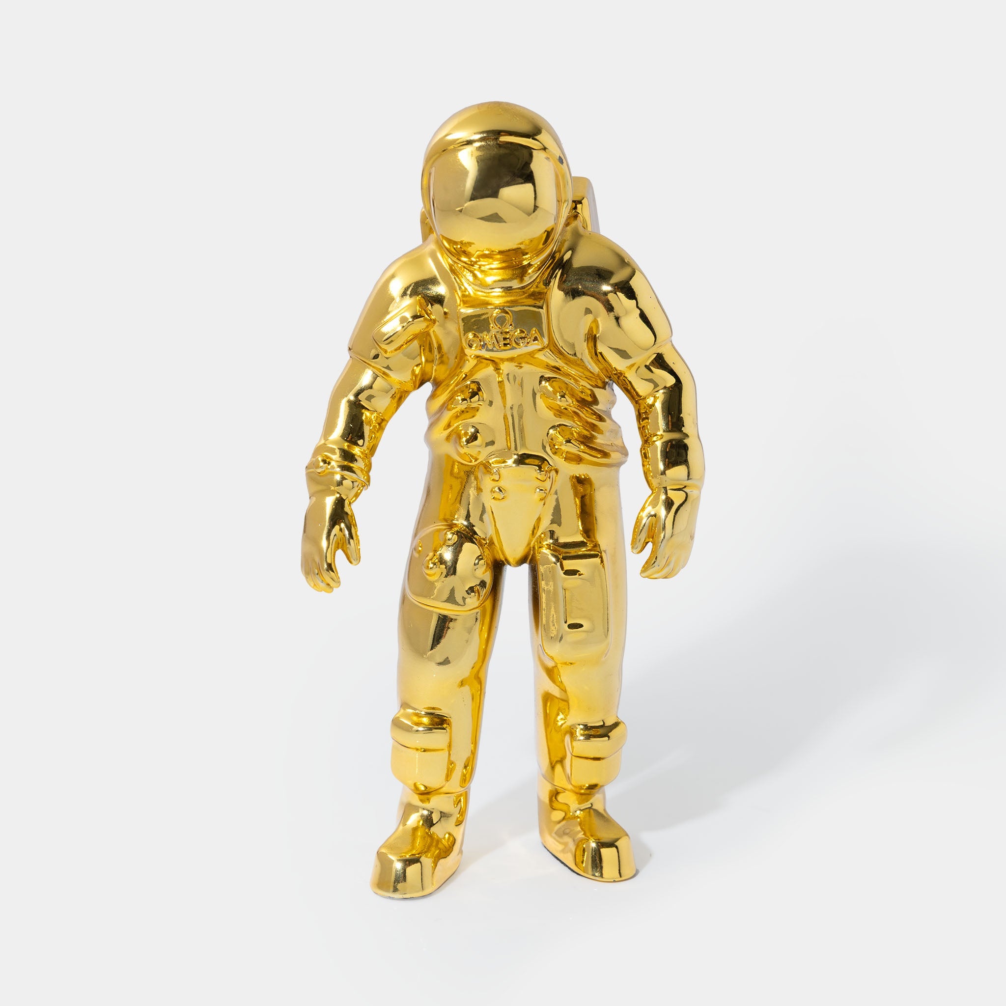Omega Astronaut collectable figurine gold colour