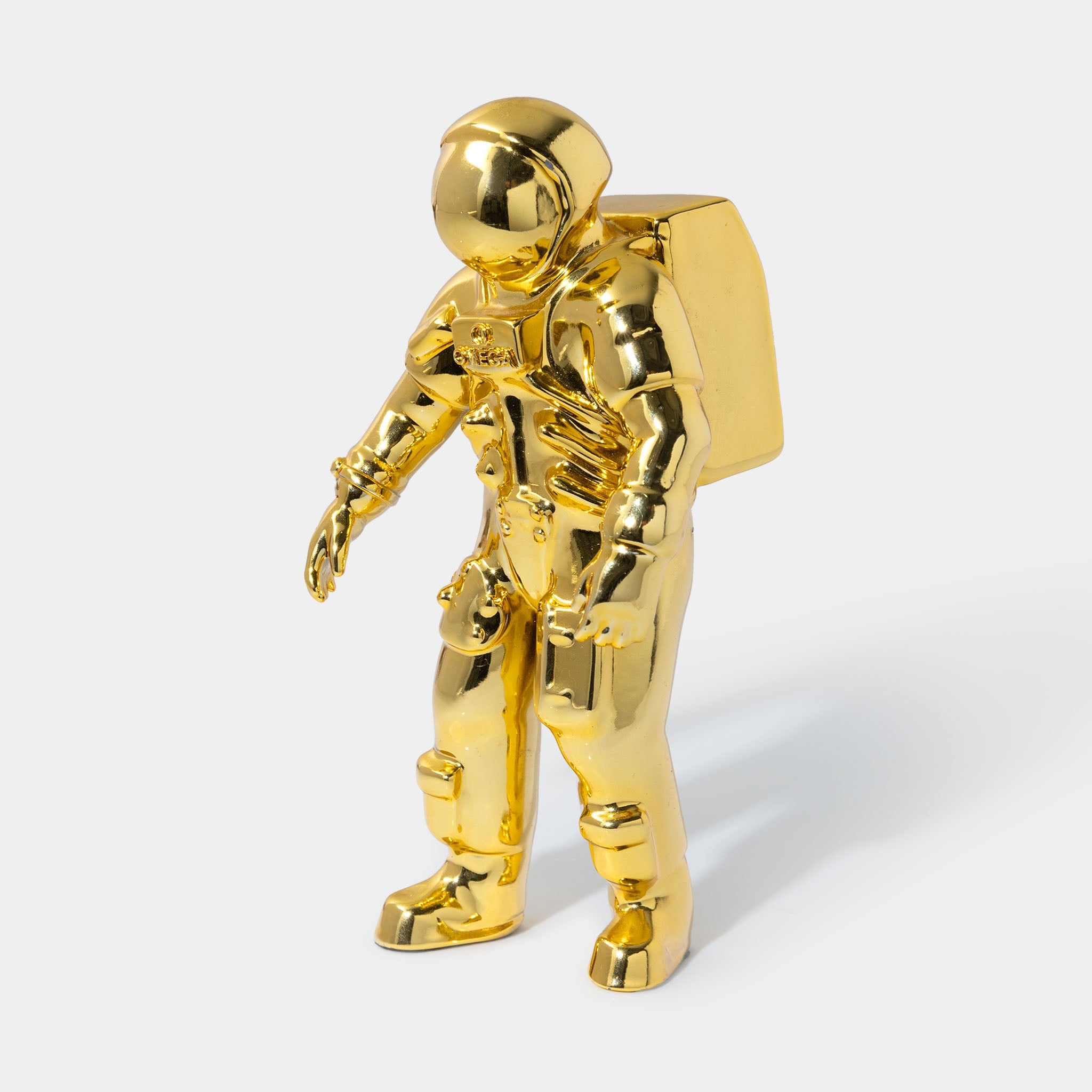 Omega Astronaut collectable figurine gold colour