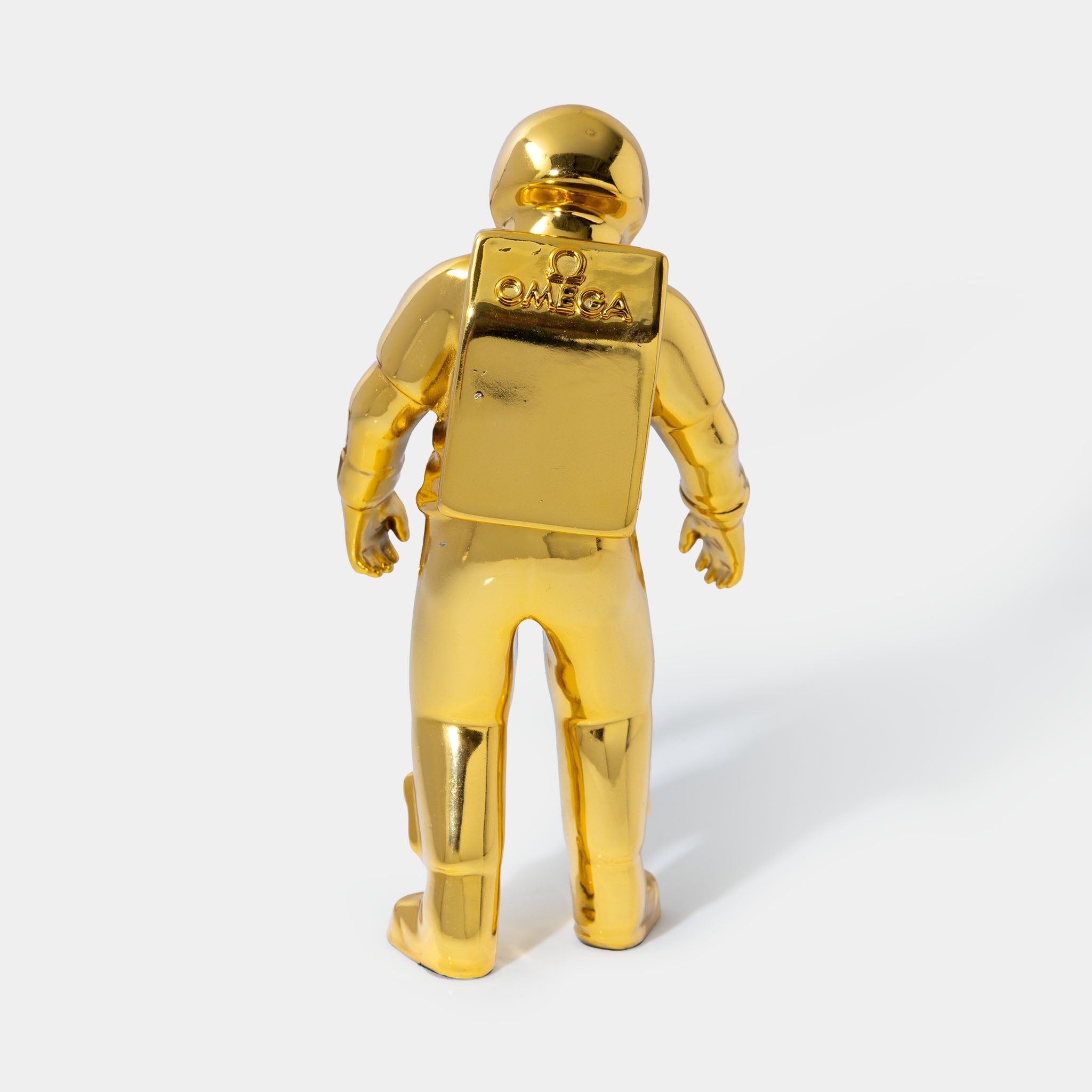 Omega Astronaut collectable figurine gold colour