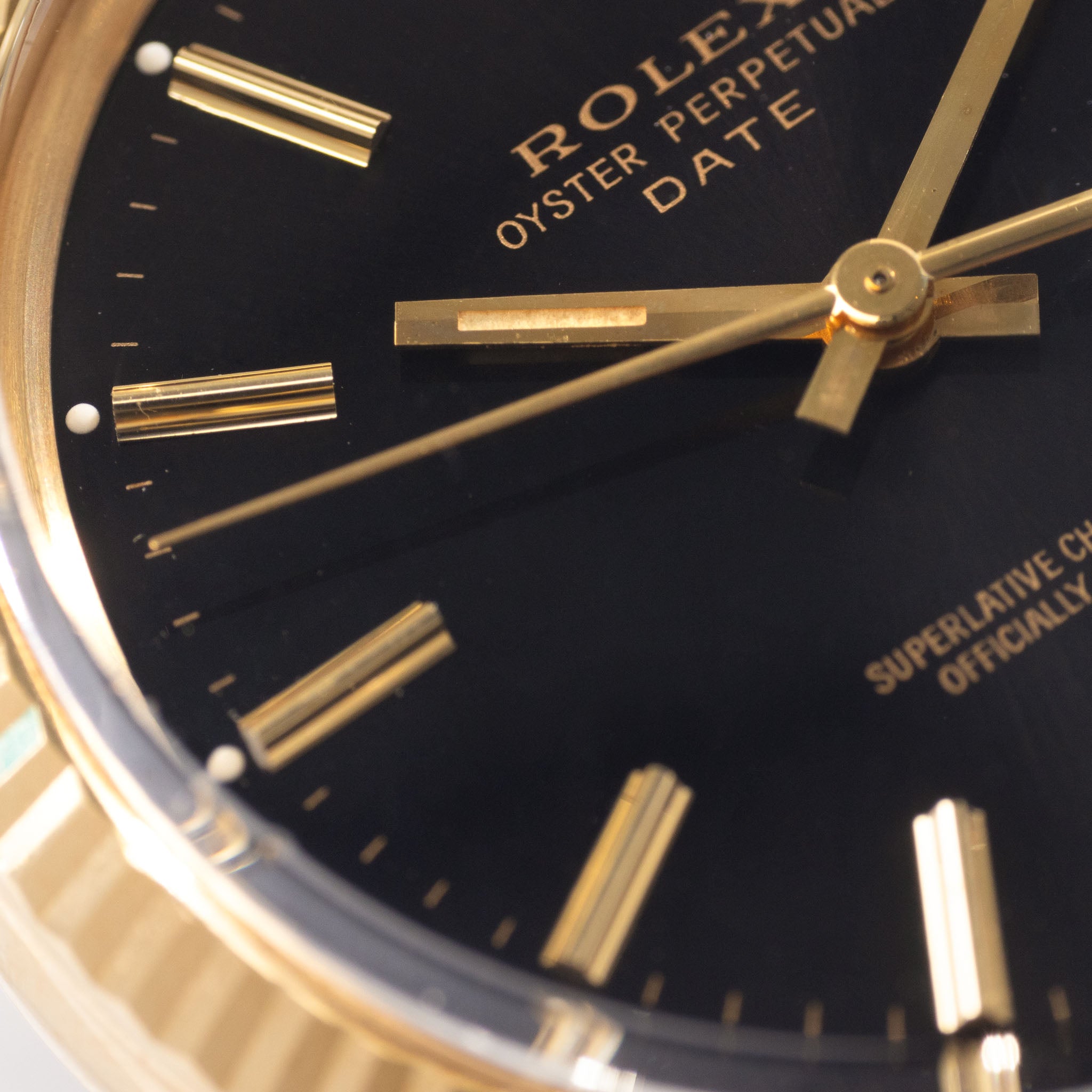 Rolex Oyster-perpetual date black dial in 18 k yellow gold ref 15038