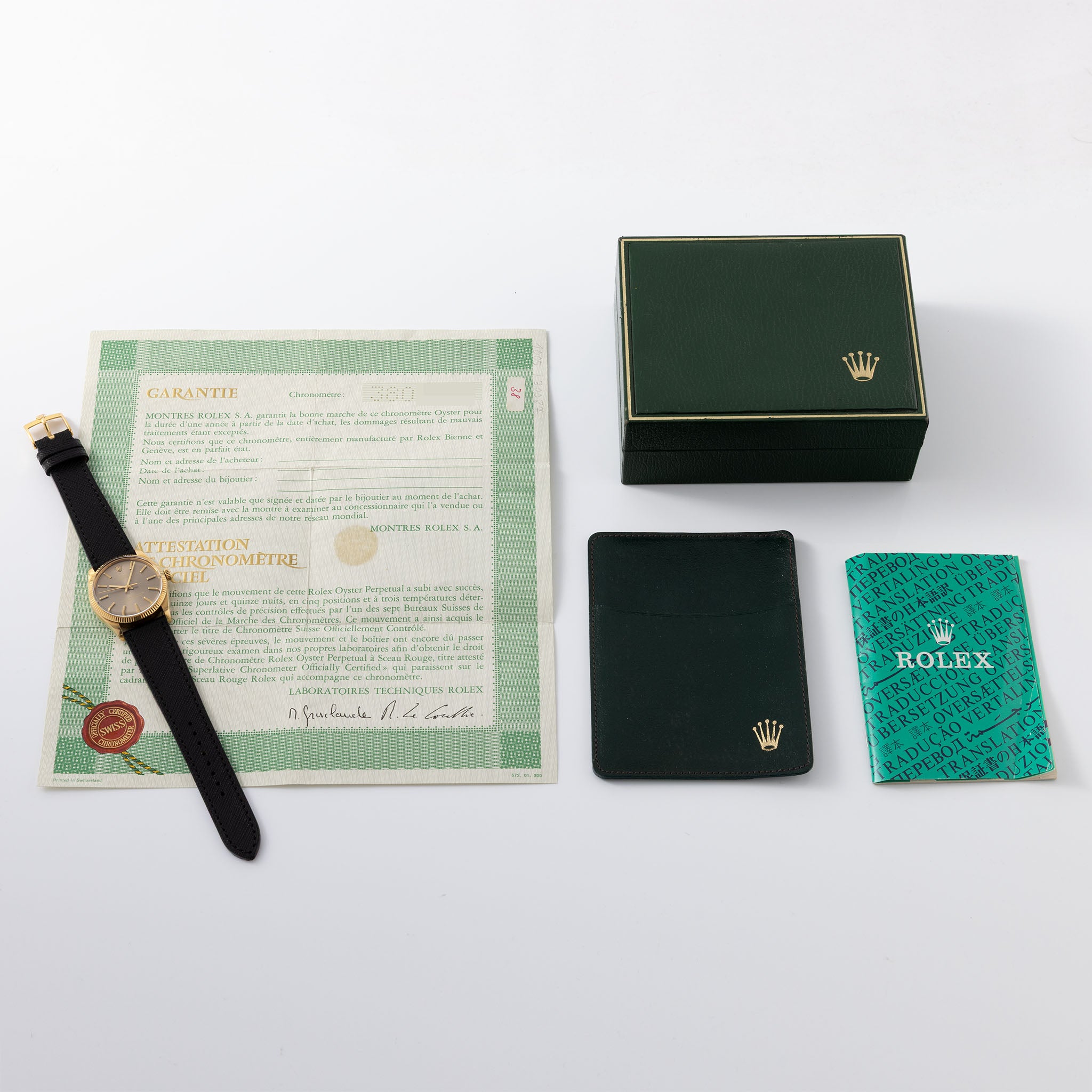 Rolex Oyster Perpetual Grey Dial in 18K Yellow Gold Ref. 1005 Box and Paper Set