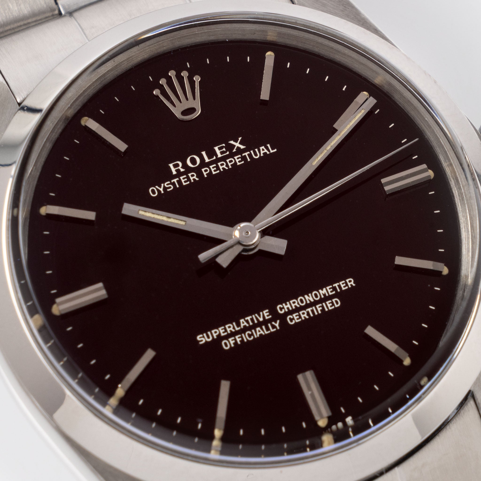 Rolex Oyster Perpetual 1002 "Burgundy Tropical Gilt Dial" with punched paper
