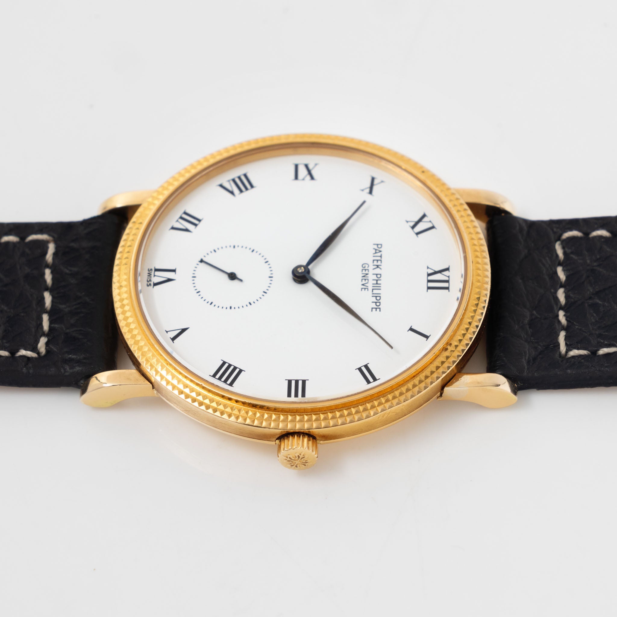 Patek Calatrava Porcelain dial , Clous de Paris 18k yellow gold case with extract from the archives ref 3919