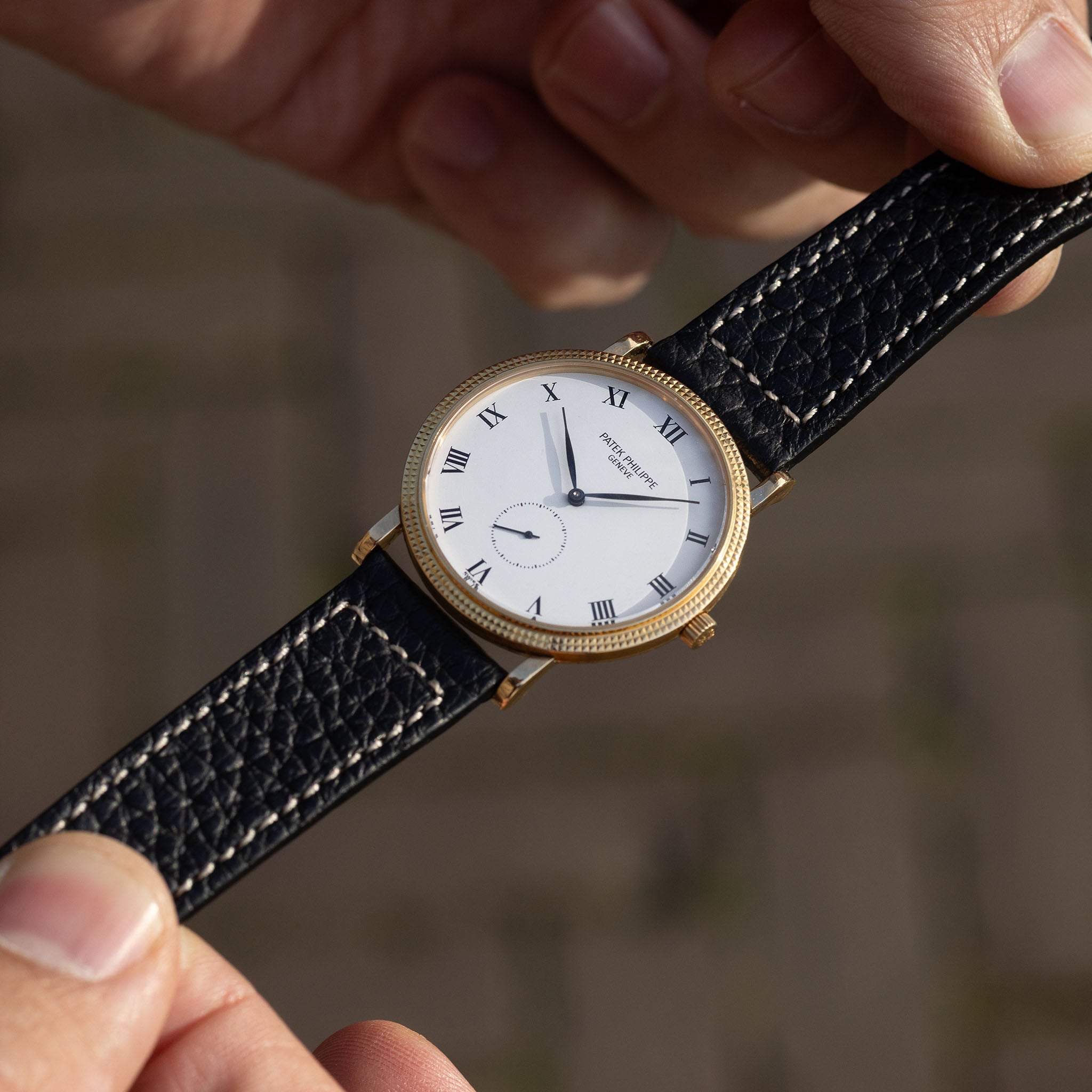 Patek Calatrava Porcelain dial , Clous de Paris 18k yellow gold case with extract from the archives ref 3919