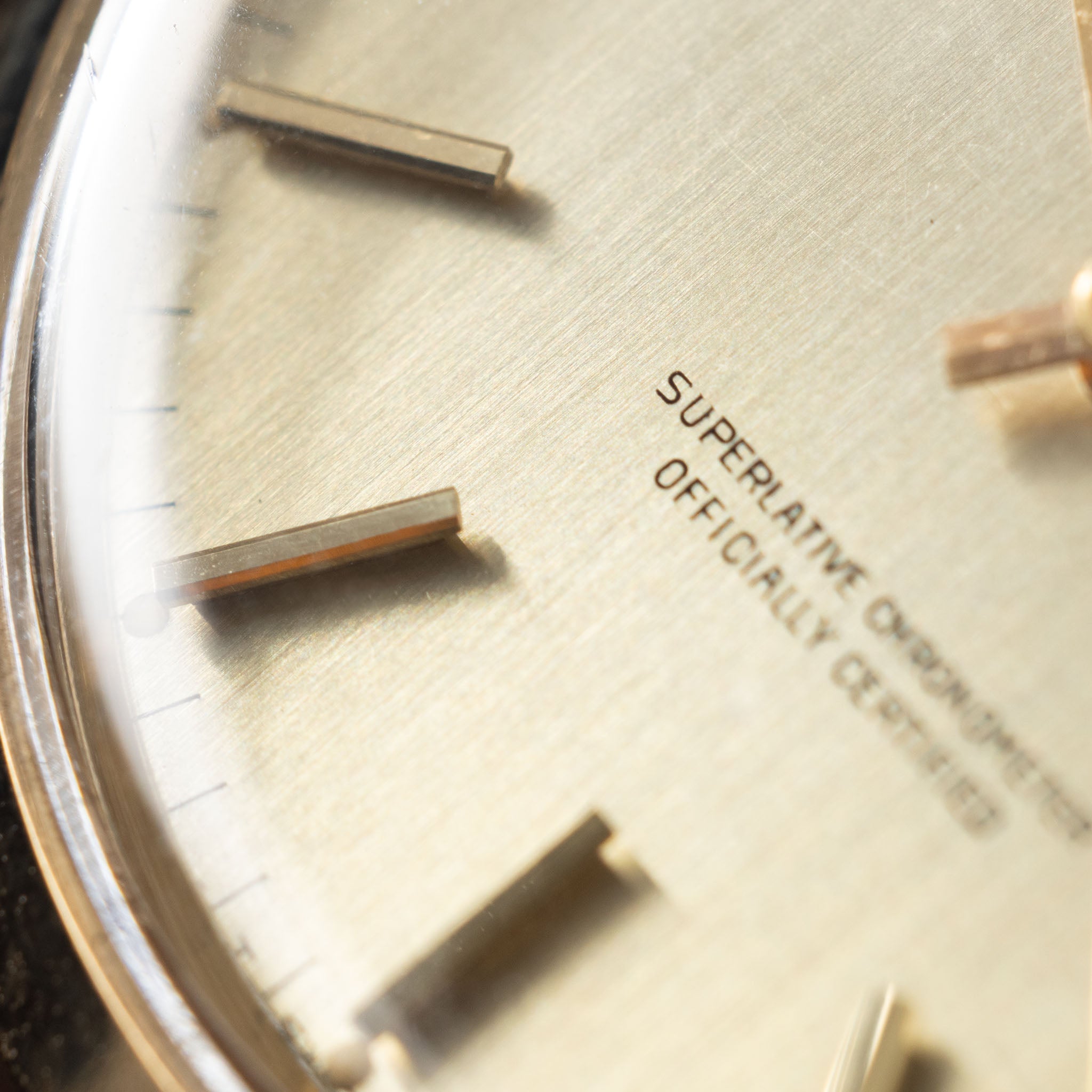 Rolex Oyster Perpetual 1002 Vertical Brush Champagne Dial in 18k Yellow Gold