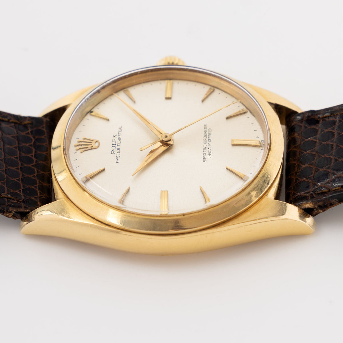 Rolex Oversized Oyster-Perpetual 1012 Silver Swiss Only Dial in 18k Yellow Gold