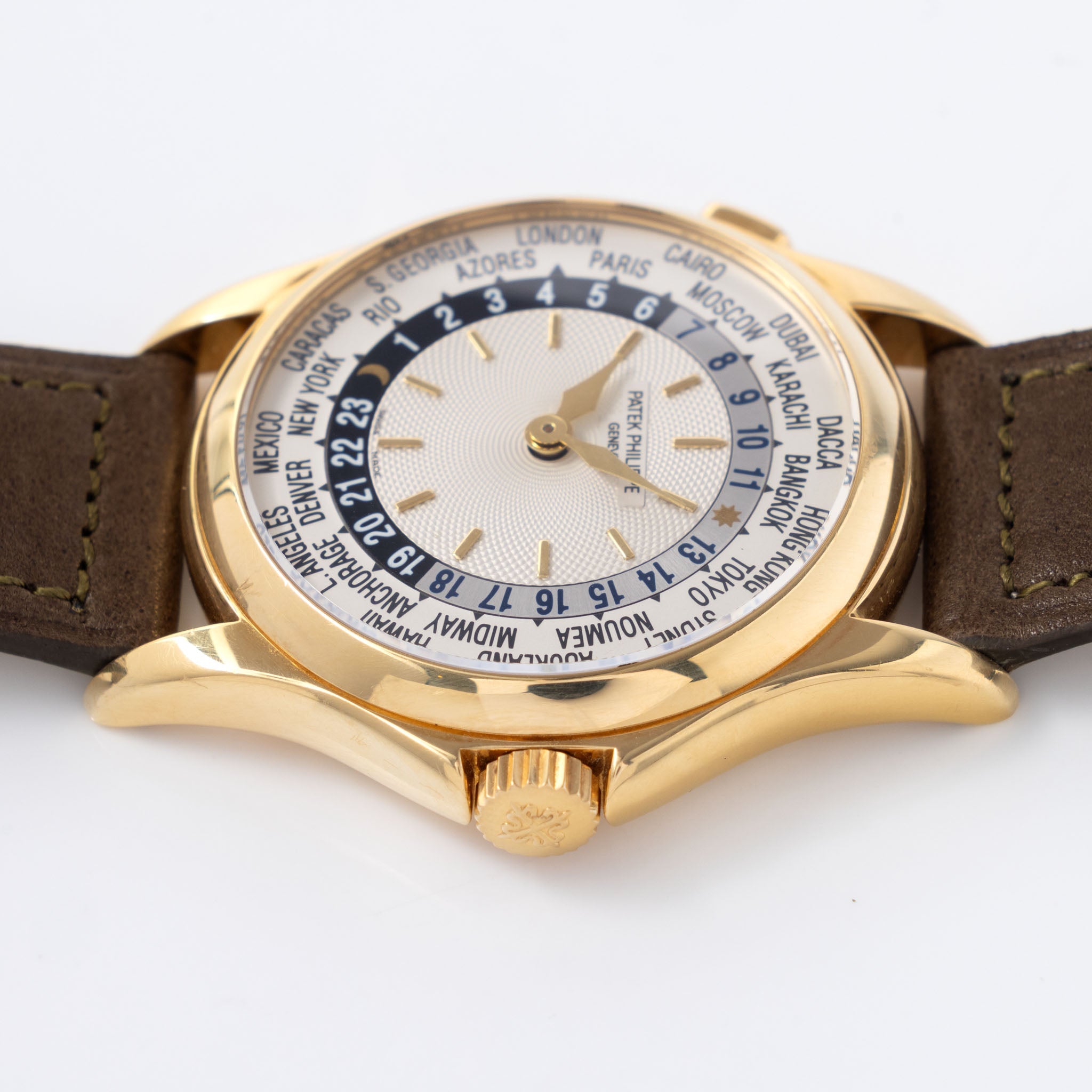 Patek Philippe World Time 5110J Guilloche Dial in 18k Yellow Gold with Extract of the Archives