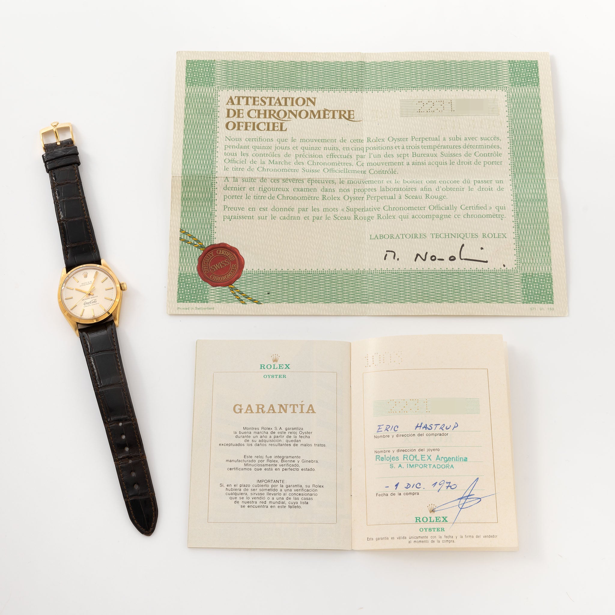 Rolex Oyster -Perpetual silver "25 years Coca Cola service " logo dial in 18 k yellow gold with original double punched papers ref 1003