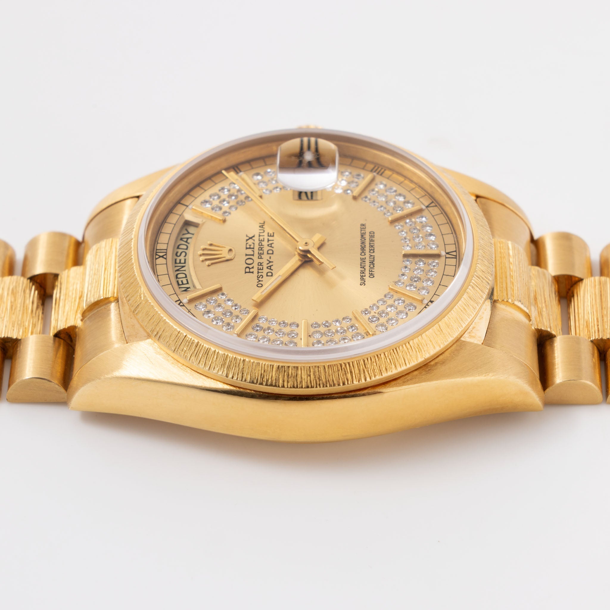 Rolex Day-Date Ref. 18078 Champagne String Diamond Dial with Bark Finish in 18k Yellow Gold