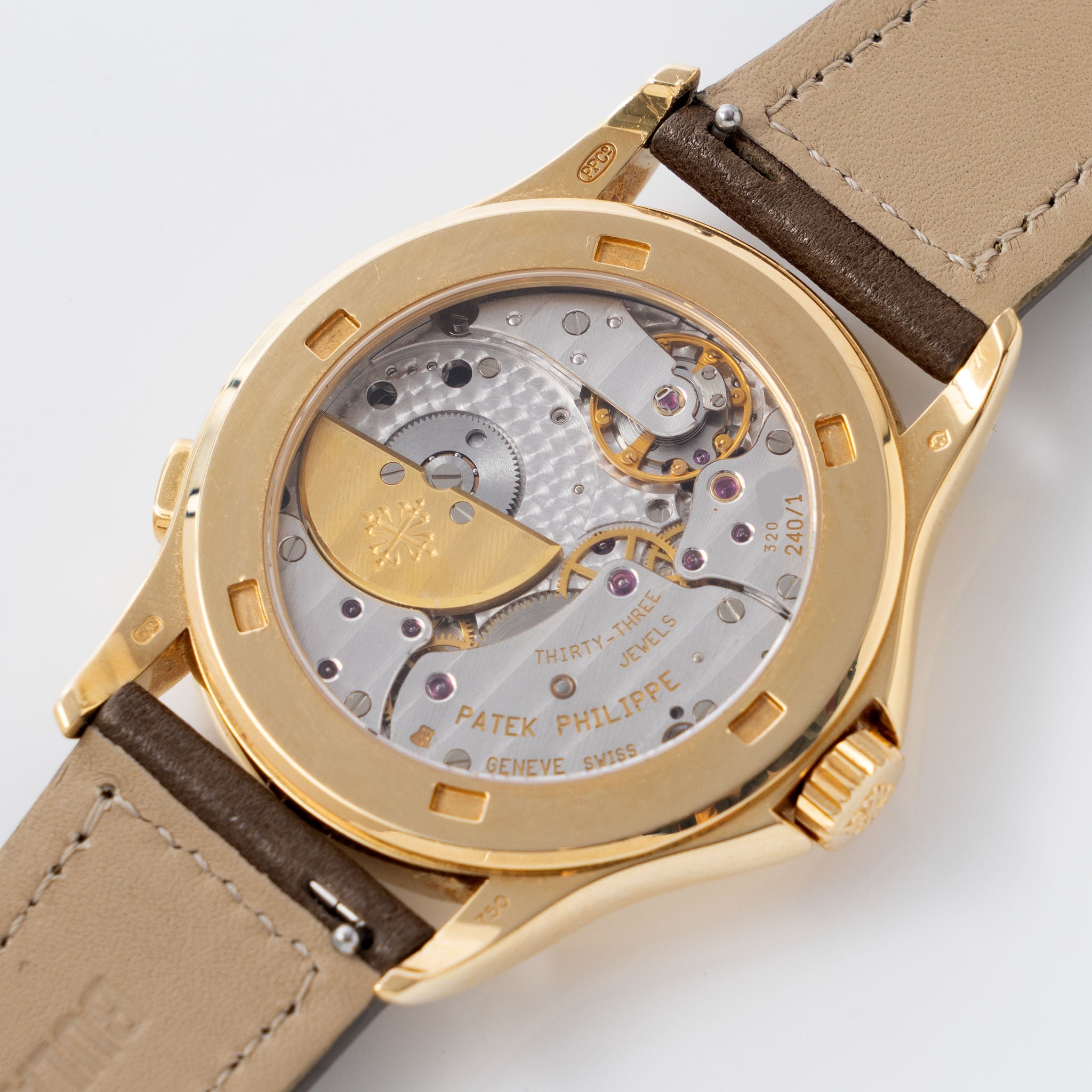 Patek Philippe World Time 5110J Guilloche Dial in 18k Yellow Gold with Extract of the Archives 
