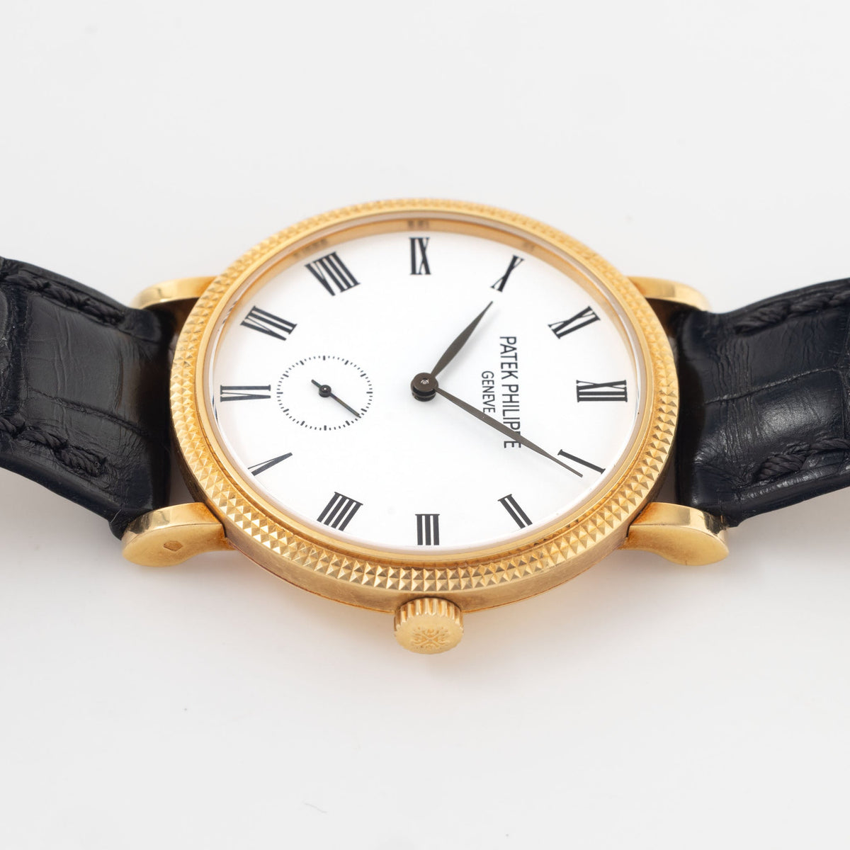 Patek Philippe Calatrava Ref 7119J 18k Yellow Gold Clous de Paris with White Roman Dial